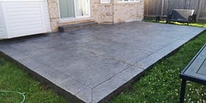 Concrete sealed patio in the backyard - Home Service Solutions